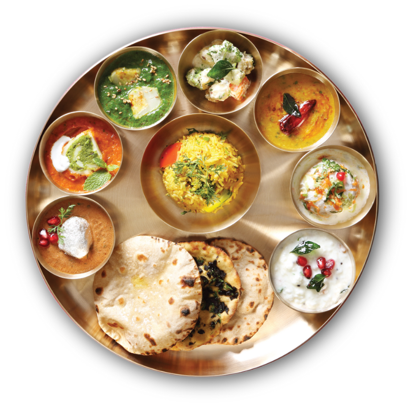 Exquisite thali presentation with a variety of delicious dishes.